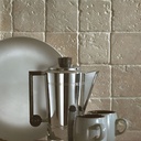 classic-light-travertin-vloertegel-10-x-10-x-1-cm-getrommeld.jpg